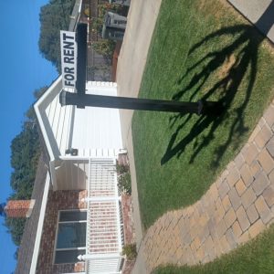 Black "L shape" sign