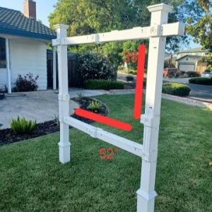 White Commercial sign that holds a sign 38inches tall by 52inches wide